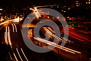 Blurred Traffic Headlights and Tail Lights on Freeway