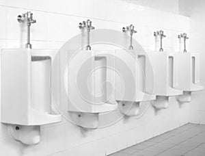 blurred of urinals in men toilet