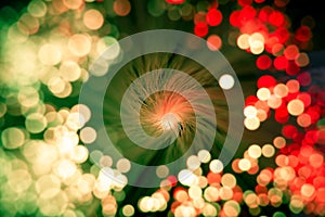 blurred vibrant vintage red and green background with shiny bokeh