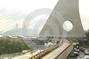 Blurred view of cars on modern bridge photo