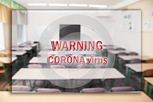 Blurred view of classroom and text WARNING CORONA VIRUS. School closings during COVID-19 pandemic