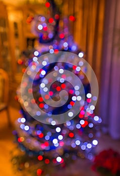 Blurred view of a lights on christmas tree