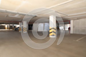 Blurred view of modern car parking garage