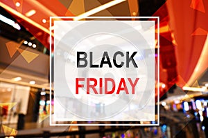 Blurred view of modern shopping mall. Black Friday Sale