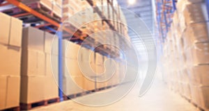 Blurred warehouse commercial business background. cargo logistics, tall shelves, boxes warehouse storage.