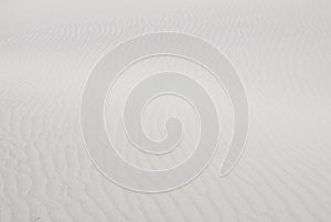 Blurred wavy white sand texture