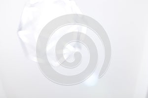 Blurred white background with heavy lights. Modern and abstract background blurred with rounded spherical geometrical shapes. Big photo