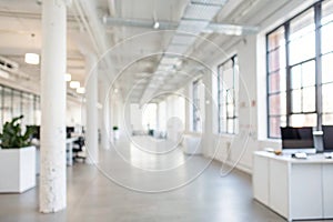 Blurred white open space office interior background