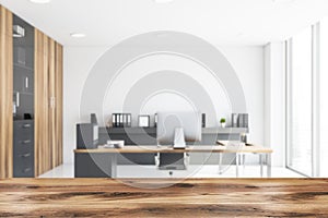 Blurred white and wooden CEO office interior