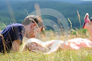 Blurred young couple in nature