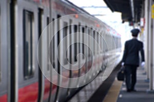 Blurring the trip at the train station in Japan. photo