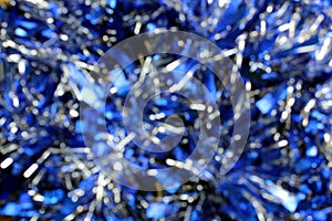 Blurry blue shiny christmas tinsel texture for decoration