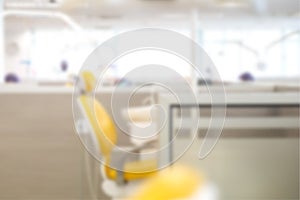 Blurry - Blur background of dental engine, dentist chair in clean and clear room for background.