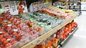 Blurry - Blur image of fresh vegetables and fruits on shelf in supermarket convenience store for background.