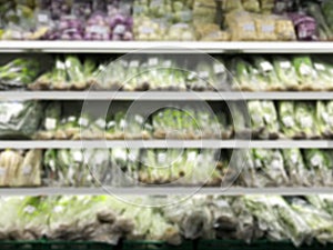 Blurry - Blur image of fresh vegetables and fruits on shelf in supermarket convenience store for background.