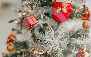 Blurry of Christmas and New Year`s balls with beautiful decorations on the Christmas treedecorations on the Christmas tree, soft l