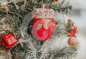 Blurry of Christmas and New Year`s balls with beautiful decorations on the Christmas treedecorations on the Christmas tree, soft l
