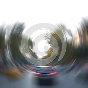 Blurry city background with cars on a road