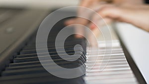 Blurry Close-up of Female Hands Playing The Piano