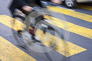 Blurry cyclist on city street