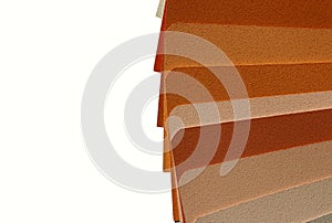 Blurry horizontal image of sample colors catalogue isolated on white background. Abstract colorful texture backdrop.