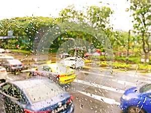 Blurry image of traffic jam during rainy day
