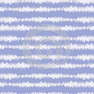 Blurry indigo blue shibori striped tie dye background. Seamless pattern with irregular broken stripe bleached resist. Dip dyed