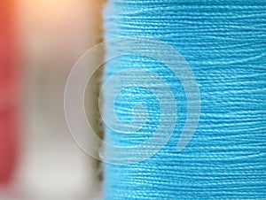 blurry light design background of blue thread on background,needlework