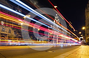 The blurry lights of city traffic. Budapest, Hungary. Evening illumination of the building.