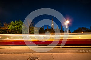 Blurry lights tram at night