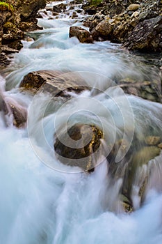Blurry motions water of river. River along the Aurlandsfjellet mountains in Norway
