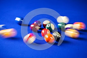 Blurry and moving of billiard balls in a pool table