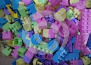 Blurry plastic toy building blocks or toy brick for background