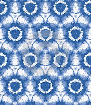 Blurry shibori sunburst tie dye background. Seamless pattern irregular circle on bleached resist white background