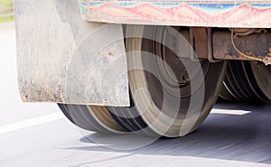 Blurry of truck wheels rotating with running at high speed