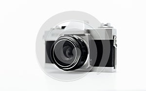 Blurry view of film camera, white background