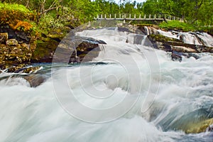 Blurry waterfall along the Aurlandsfjellet mountains in Norway