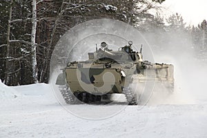 BMP-3M on cruise trials in the winter forest photo