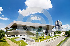 BMW house in Munich is located next to the headquarter of a company and the museum of BMW.