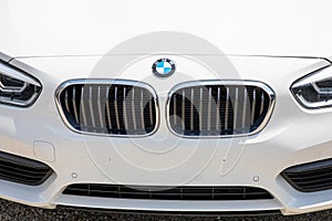 BMW logo text and brand sign on new modern germany car hood