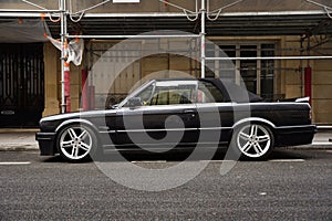 BMW 3 Series in Front of Apartment Building in Paris, France