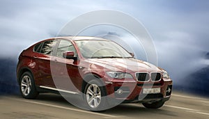 BMW X6 red car.