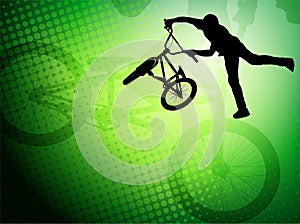 Bmx cyclist on the abstract background photo