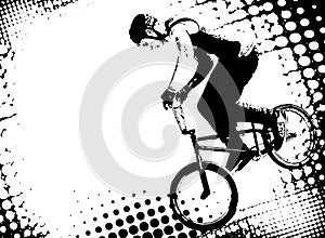 Bmx cyclist on the abstract halftone background