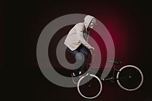 Bmx cyclist performing stunt