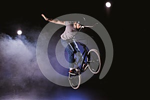 Bmx cyclist performing stunt