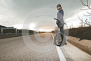 BMX rider doing tricks. Young man with a bmx bike. Extreme sports