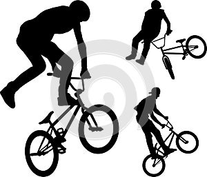 Bmx stunt cyclists silhouettes