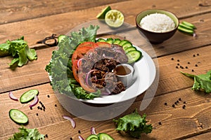 Bo Luc Lac vietnamese beef salad photo