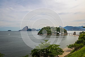 Boa Viagem Beach and Island with Rio de Janeiro Skyline on background - Niteroi, Rio de Janeiro, Brazil photo